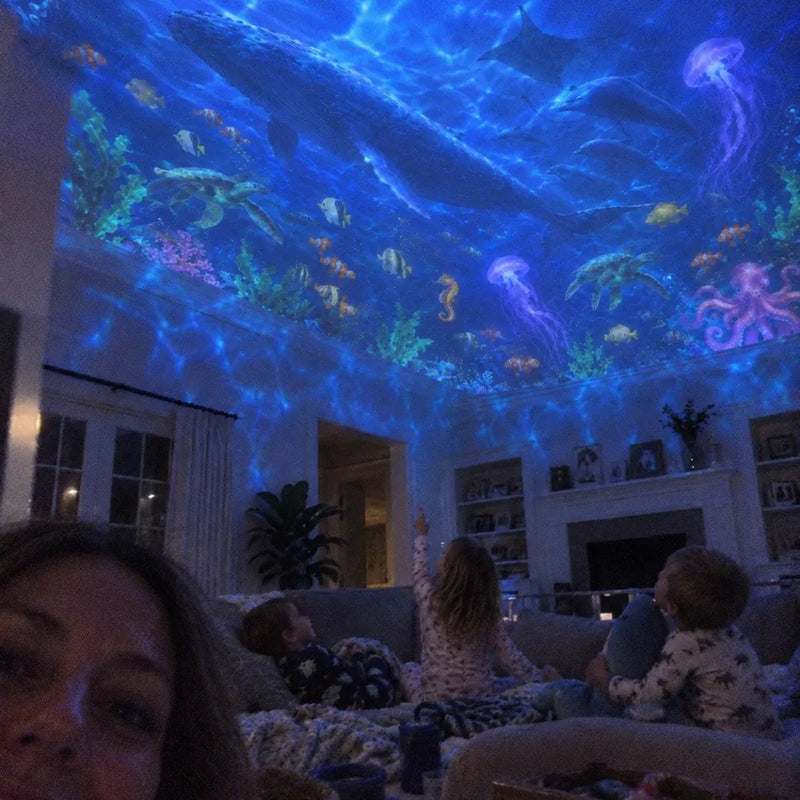 Customer photo: a family on the sofa under an ocean ceiling