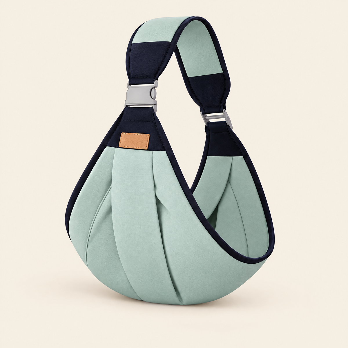 Little Perch toddler carrier in mint green with navy strap